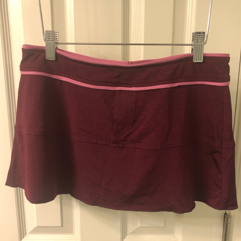 Becca size XS/ S swim skirt in burgundy and pink